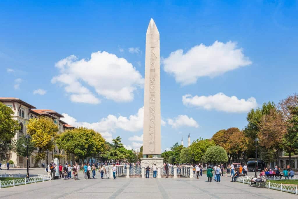 Ancient Egyptian Obelisk of Theodosius with hieroglyphs standing tall in Sultanahmet Square, Istanbul, Turkey.