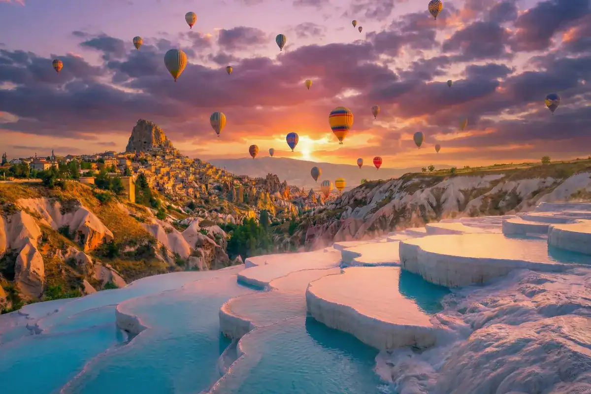 Sunrise view featuring hot air balloons in Cappadocia and white travertines of Pamukkale for the 3 Days Cappadocia and Pamukkale Tour from Istanbul.